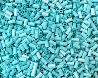 10g, T55, 3mm Bugle- Opaque Turquoise. Toho Japanese Beads