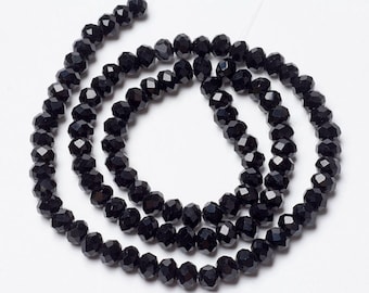 3 x 4mm, Faceted Black Glass Rondelles, .8-1mm hole, about 105-110pcs strand, 39cm.