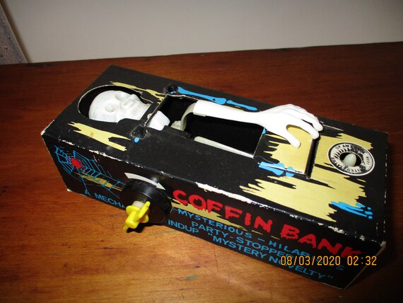 coffin bank toy