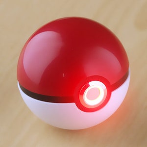 Pokeball Pokemon Pikachu, realistic on and off image 1