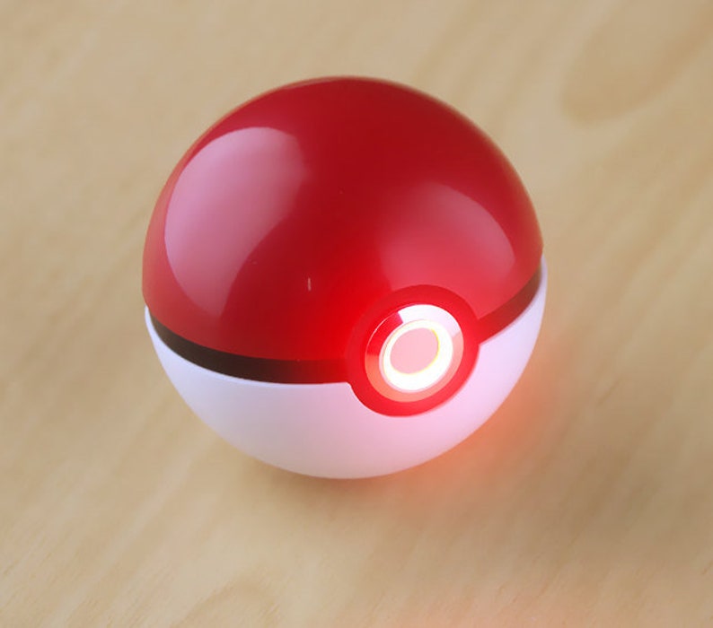 Pokeball Pokemon Pikachu, realistic on and off image 1