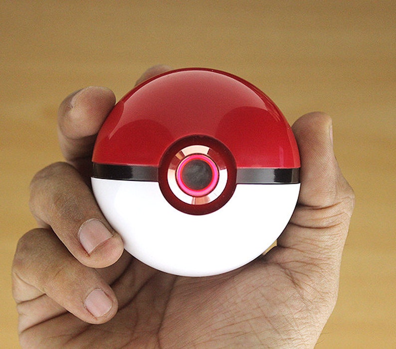 Pokeball Pokemon Pikachu, realistic on and off image 7