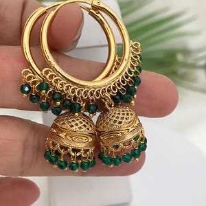 May include: A rustic wooden sign with the text "Welcome to our home" in white lettering. The sign features a distressed finish and a simple, inviting design, perfect for entryway decor.