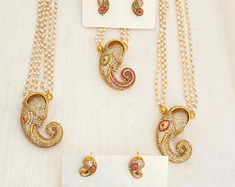 Gold Plated AD/CZ Ganesha Pendant Necklace,Ruby-Green Kemp/Kempu Stone,AD Stud Earrings,South Indian Necklace,Bollywood Jewelry,Pearl Chain