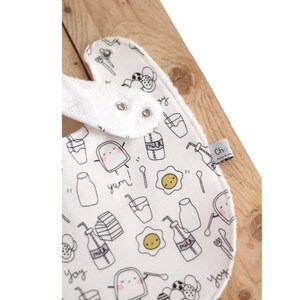 Adjustable baby bib in Oeko-Tex jersey and “Yum” terry towel