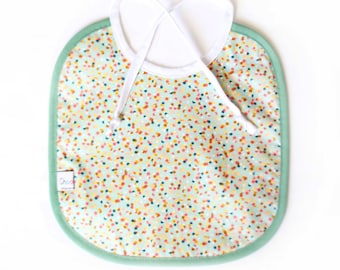 Coated cotton baby bib / Cotillons