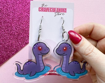Pendientes acrílicos con dije del monstruo del lago Ness, «Nessie»