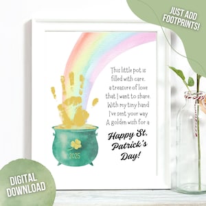 May include: Framed print featuring a watercolour rainbow over a green pot of gold. A handprint is above the pot. Text reads "Happy St. Patrick's Day!" and "2025". The words "Digital Download" are also visible.