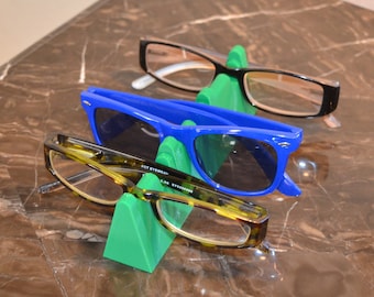 Change Holder Accessoires Zonnebrillen & Eyewear Brillenstandaarden SunglassesMule – Multi Glasses Houder Stand Toetsen 