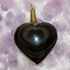 Colgante de obsidiana ojo celestial, en forma de corazón
