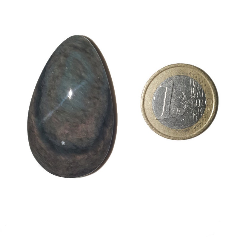 Cabochon in obsidian manto huichol mentogochol