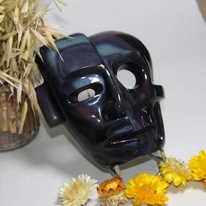 Mask of life and death in celestial eye obsidian