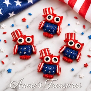 May include: Four patriotic owl figurines in red, white, and blue, each wearing a top hat. The owls have large eyes and are surrounded by star and sprinkle decorations. The text "Annie's Treasures" is at the bottom.