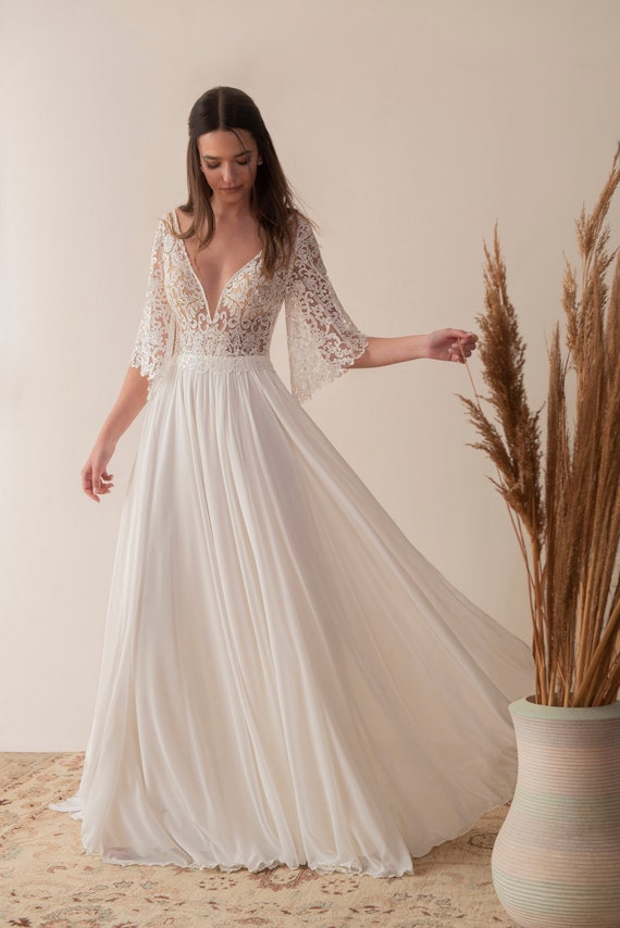 Beautiful Bohemia Floral Deep V Neck Trumpet Sleeve Vacation Dresses Beautiful Bohemia Floral Deep V Neck Trumpet Sleeve Vacation Dresses