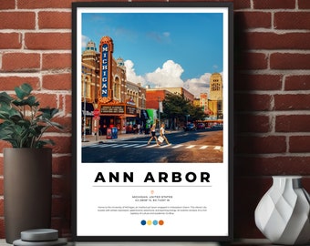 May include: A vintage-style poster featuring a colorful street scene in Ann Arbor, Michigan. The poster includes the text "MICHIGAN, UNITED STATES 42.2808° N, 83.7430° W" and a description of the city. The poster is framed in black.