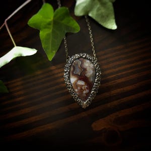 brown mocha earthy tones colors jewelry mexican crazy lace agate necklace pendant gold tone texture organic natural pear shape bronze brass banded agate handmade handcrafted artisan jewelry woman owned gift ideas gift for her