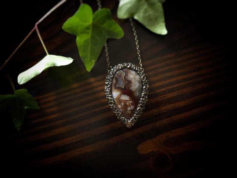 brown mocha earthy tones colors jewelry mexican crazy lace agate necklace pendant gold tone texture organic natural pear shape bronze brass banded agate handmade handcrafted artisan jewelry woman owned gift ideas gift for her