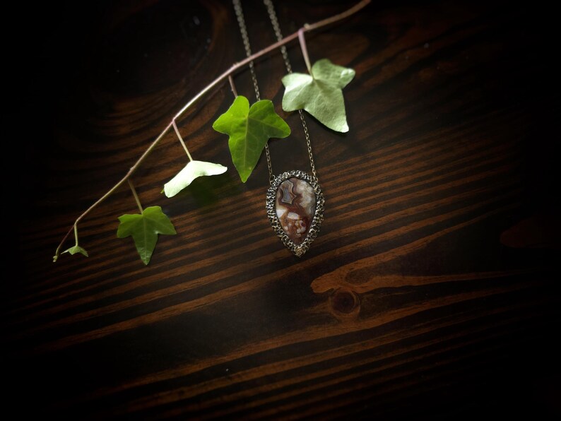 brown mocha earthy tones colors jewelry mexican crazy lace agate necklace pendant gold tone texture organic natural pear shape bronze brass banded agate handmade handcrafted artisan jewelry woman owned gift ideas gift for her