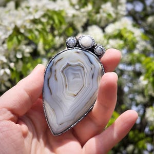 banded montana agate moonstone pendant handmade handcrafted statement piece necklace jewelry white blue translucent gorgeous