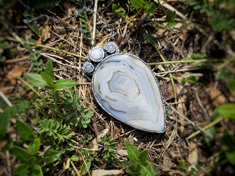 banded montana agate moonstone pendant handmade handcrafted statement piece necklace jewelry white blue translucent gorgeous