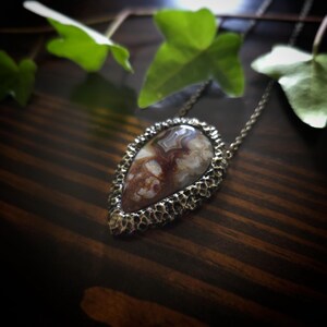 brown mocha earthy tones colors jewelry mexican crazy lace agate necklace pendant gold tone texture organic natural pear shape bronze brass banded agate handmade handcrafted artisan jewelry woman owned gift ideas gift for her