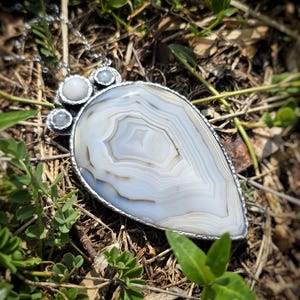 banded montana agate moonstone pendant handmade handcrafted statement piece necklace jewelry white blue translucent gorgeous