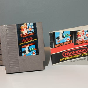 Vintage 1980s Nintendo NES Super Mario Bros and Duck Hunt Two-in-One Video Game with Instruction Manual