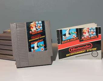 Vintage 1980s Nintendo NES Super Mario Bros e Duck Hunt Two-in-One Videogioco con manuale di istruzioni
