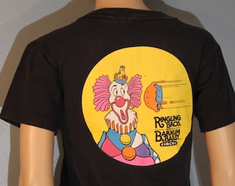 Vintage 1980-tals Ringling och Barnum Bailey Circus Clown and Pie Ungdom L Grafisk T-shirt Tillverkad i USA