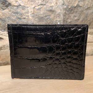 Vintage 1980s-1990s Arnold Constable negro genuino cocodrilo cuero cartera