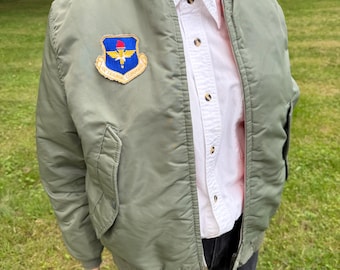 Kurtka bomberka Vintage Authentic Air Training Command w kolorze zielono-pomarańczowym, dwustronna, dla dorosłych, rozmiar M