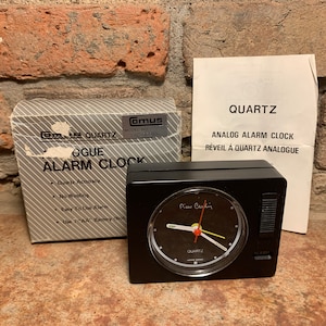 Vintage 1970s Comus Pierre Cardin Quartz Analog Travel Alarm Clock Model No. TAC-373RW New in Box