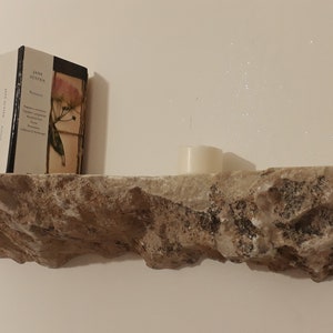 Shelf made in natural stone