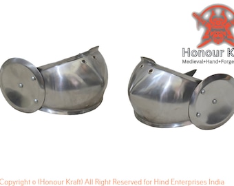 May include: A pair of silver metal medieval-style arm guards with round shields attached to the back of each guard. The guards are hand-forged and have a smooth, polished finish.  Honour Kraft Medieval+Hand+Forged+Armor.
