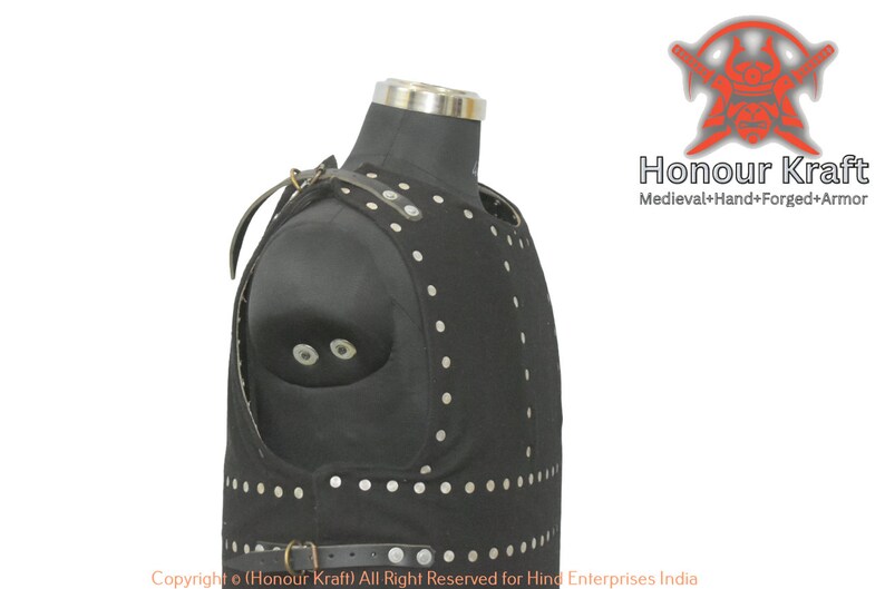 May include: Black leather armor vest with silver rivets and a leather strap. The vest is displayed on a mannequin. The text "Honour Kraft Medieval+Hand+Forged+Armor" is visible in the image.