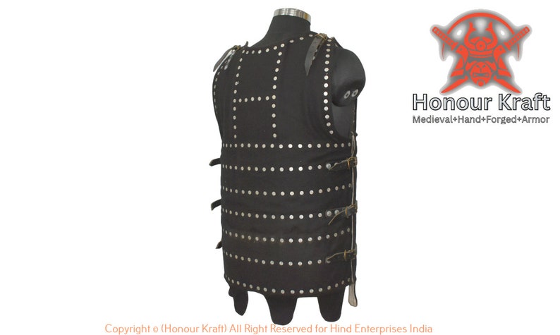 May include: A black leather vest with metal rivets and straps. The vest is designed to look like medieval armor. The text "Honour Kraft Medieval+Hand+Forged+Armor" is visible in the image.