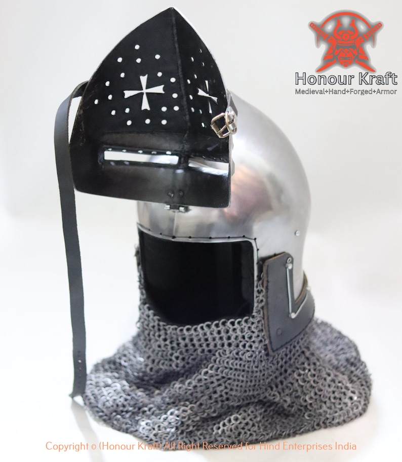 May include: A medieval helmet with a chainmail coif and a visor. The helmet is made of steel and has a cross design on the visor. The helmet is on a white background.
