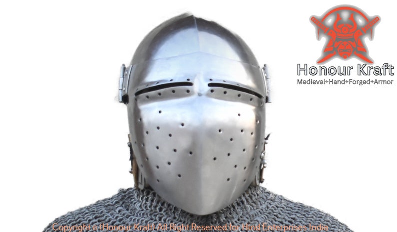 May include: A silver helmet with a visor and a chainmail collar. The helmet has a series of small holes throughout the visor and is made of metal.