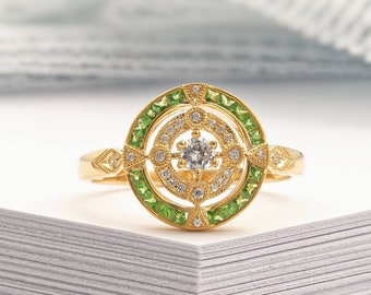 Antique Art Deco inspired yellow gold ring with diamond and peridot halo