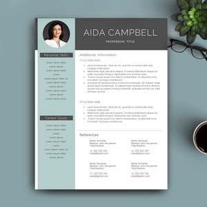 Puede incluir: Un curr&iacute;culum de Aida Campbell con una foto profesional, que enumera las habilidades personales, los objetivos profesionales, informaci&oacute;n adicional y referencias. El curr&iacute;culum est&aacute; formateado con un esquema de color gris y azul.