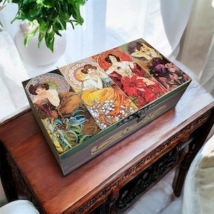 Kerstcadeau: handgemaakte herinneringsdoos van Alphonse Mucha: om kostbare momenten te bewaren.