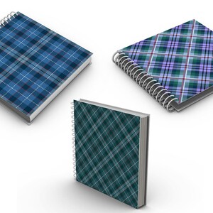 May include: Three spiral bound notebooks with different plaid patterns. The notebooks are blue, green, and purple.