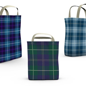 May include: Three tote bags with different plaid patterns. The bags are made of a sturdy fabric and have a simple design. The bags are all in shades of blue, green, and white.
