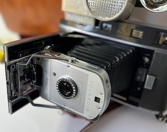 Tominon 127mm F4.7 Lens in Polaroid Copal Shutter W/ 3 5/8 Board