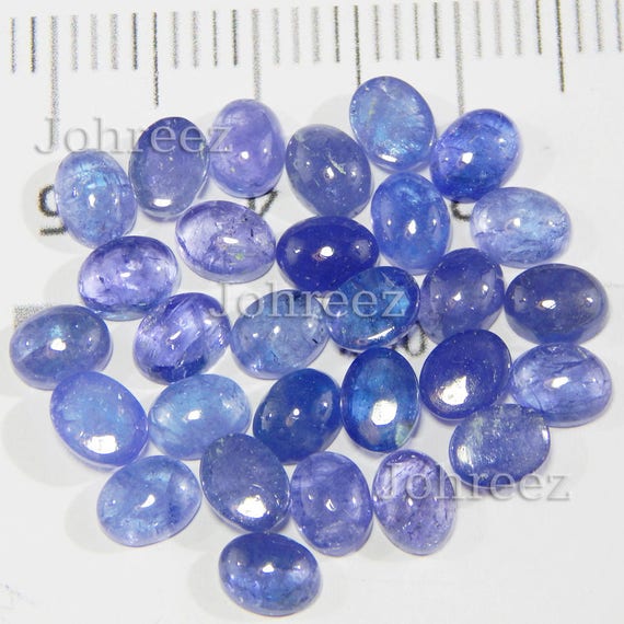 10 Piece Natural Tanzanite Cabochons: Oval Gemstone Lot (5x7 to 10x12 mm)