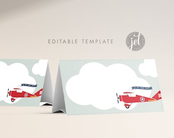 May include: Printable place card template featuring a red airplane flying in a blue sky with white clouds. The text on the banner reads "Up Up and Away!"