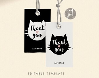 May include: Two gift tags, one black and one white, with a cat face design and the words "Thank you" in script. Each tag has a pink heart and the name "Katherine" below. Gray string is attached.