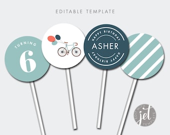 May include: Four printable cupcake toppers with a blue and white color scheme. The toppers feature a bicycle with balloons, the words "Happy Birthday Asher", the number "6" and a blue and white striped pattern.