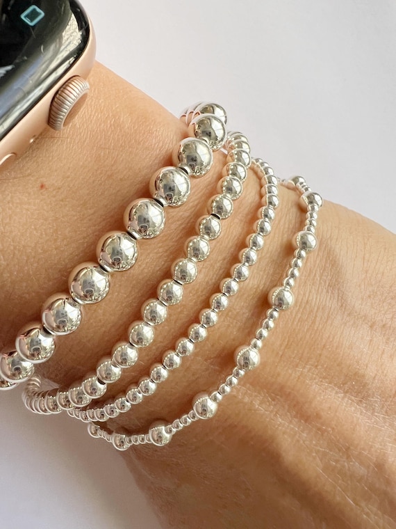 Set Bracciali Elasticizzati Con Perline E Croce, Colore Oro - Gioielli Fashion Impilabili Per Donna, Ipoallergenici E Antiossidanti. Regalo Perfetto Per Compleanno, Festa Della Mamma, Natale - 2