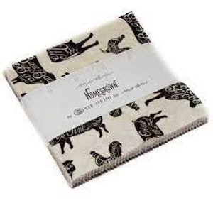 May include: A pack of 5-inch fabric squares featuring a black and white print of farm animals on a cream background. The fabric squares are labeled "Homestead" by "The Stitchery"